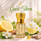 Gold and clear Gucci Flora perfume bottle with lemons and flowers on a light background. 6ML