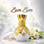 Perfume bottle with gold design and 'Zam Zam' branding on a white background with flowers.