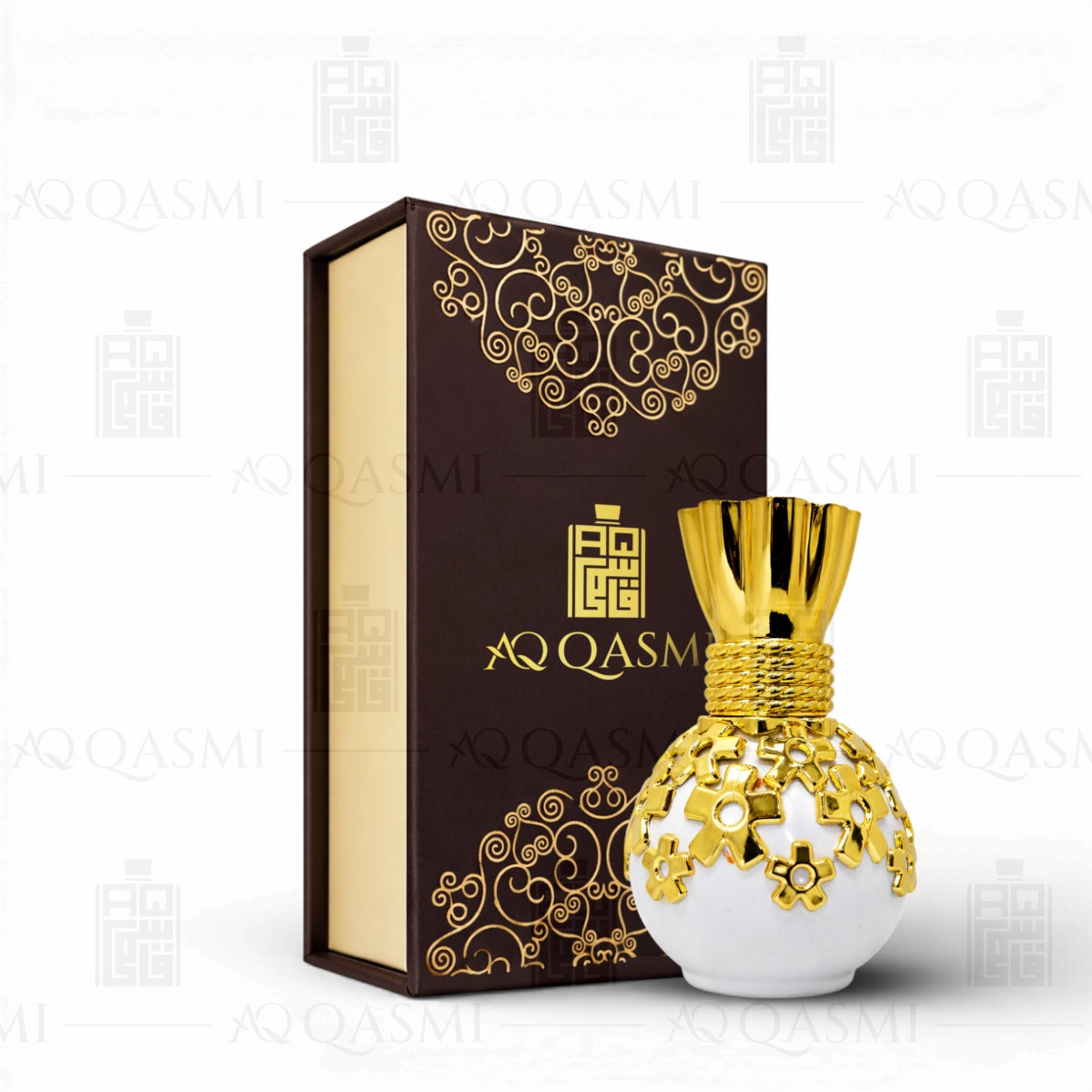 Decorative perfume bottle with gold accents and matching box featuring 'AQ Qasm' branding on a white background.