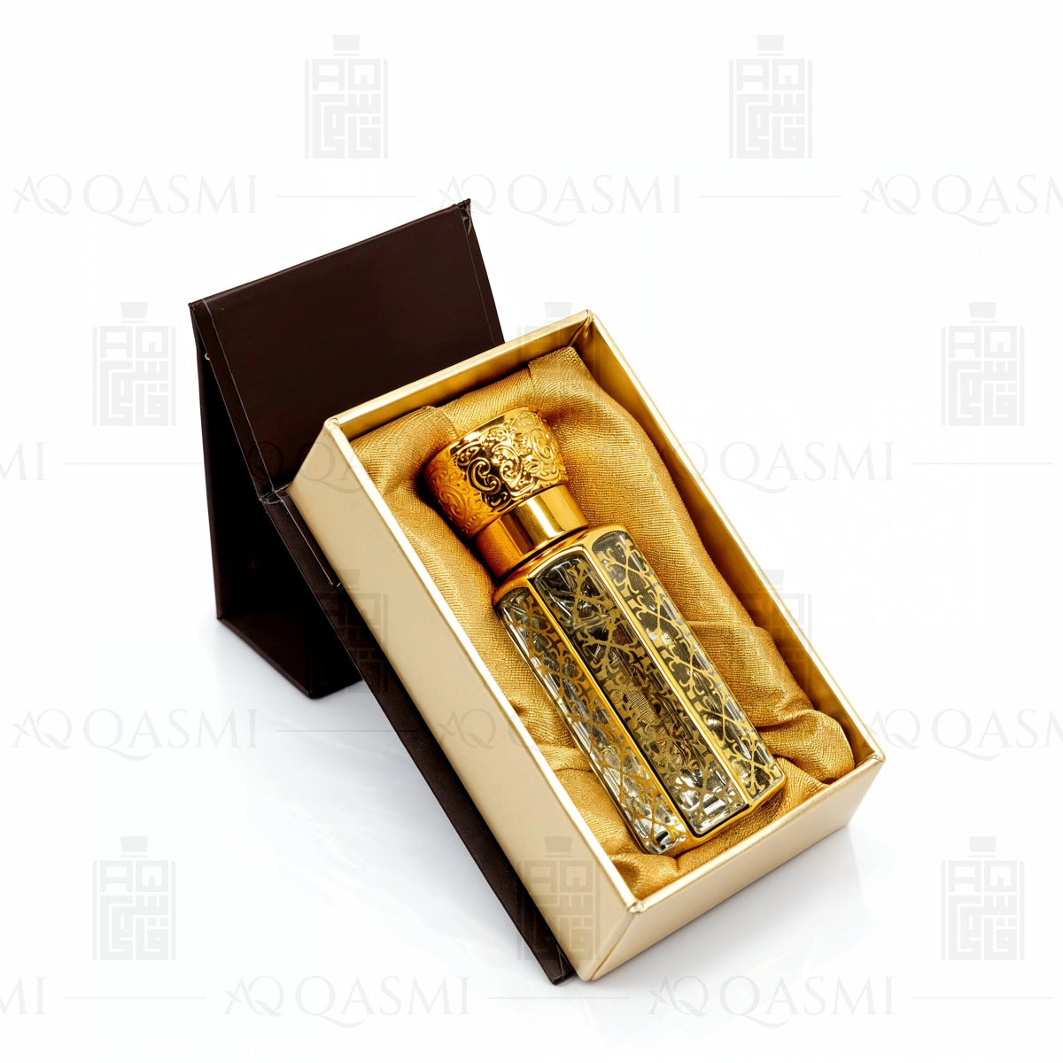 Decorative gold and clear glass perfume bottle with dropper on a white background. 12ML