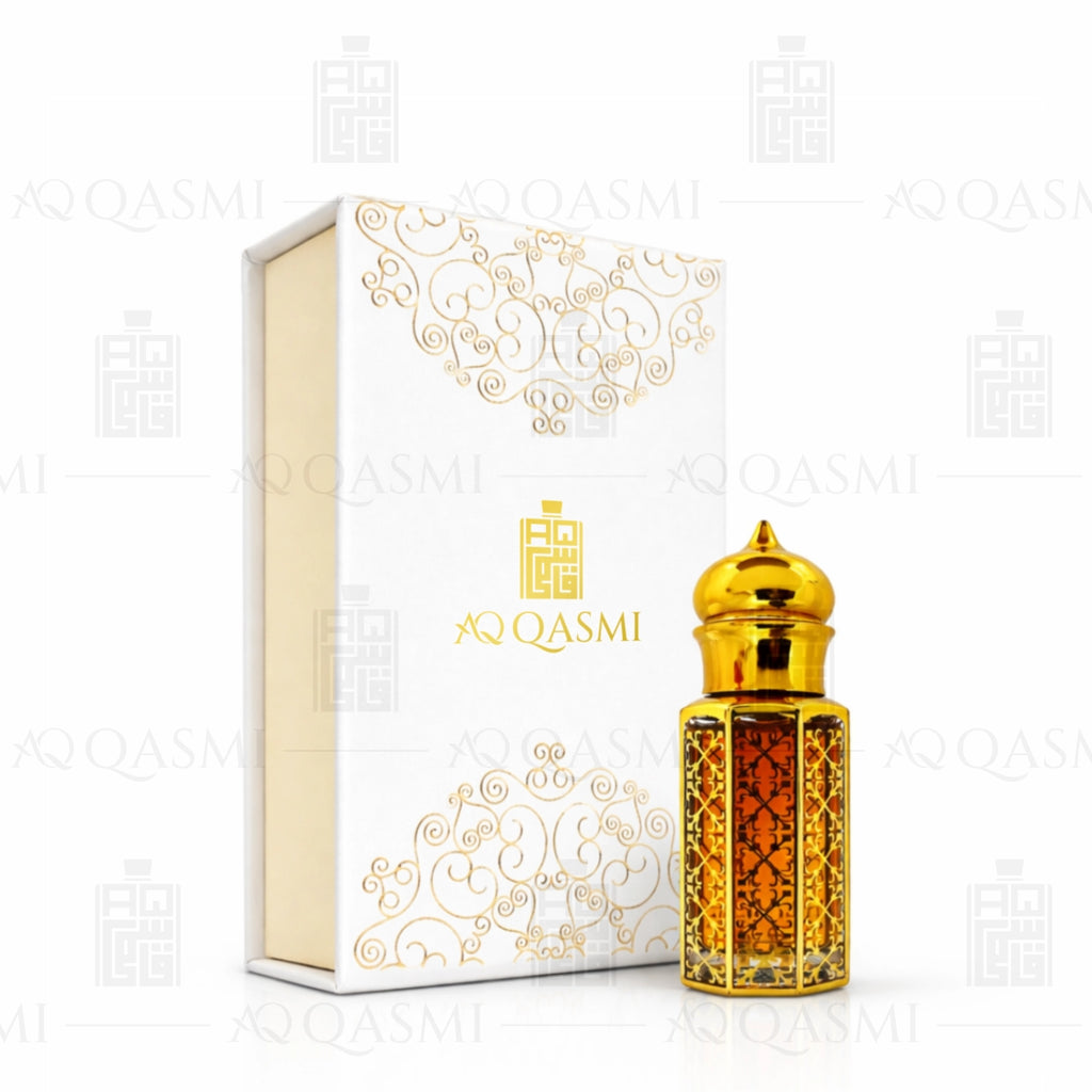 Gold and amber glass bottle with intricate design on a white background. 12ML