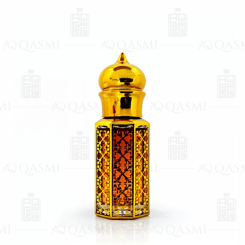 Gold and amber glass bottle with intricate design on a white background. 12ML